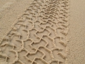 tyre-track-in-the-sand.jpg